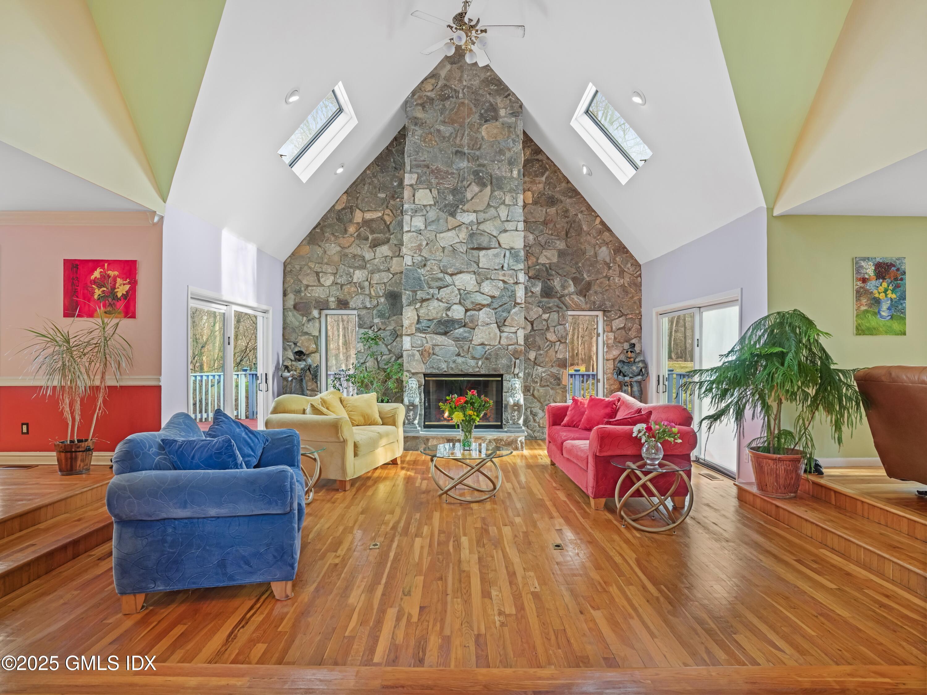 681 River Road Cos Cob, CT 06807 - Photo 7 of 44 a living room with furniture and a fireplace