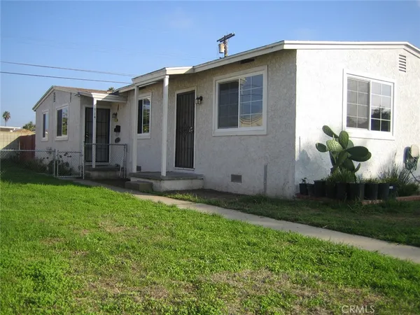 a front view of house with yard