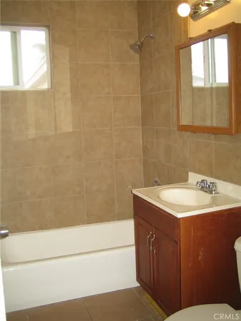 a bathroom with a sink and a bathtub