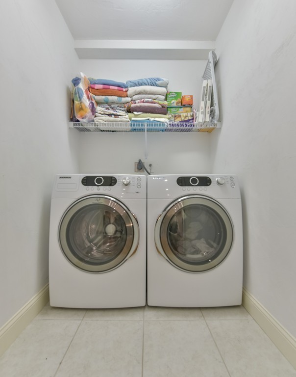 88 Wiswall Road Newton, MA 02459 - Photo 14 of 30 a utility room with washing machine