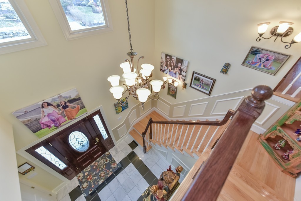 88 Wiswall Road Newton, MA 02459 - Photo 15 of 30 a living room with furniture and a table