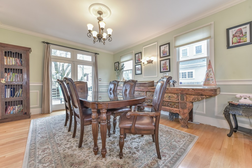 88 Wiswall Road Newton, MA 02459 - Photo 17 of 30 a view of a dining room with furniture window and wooden floor