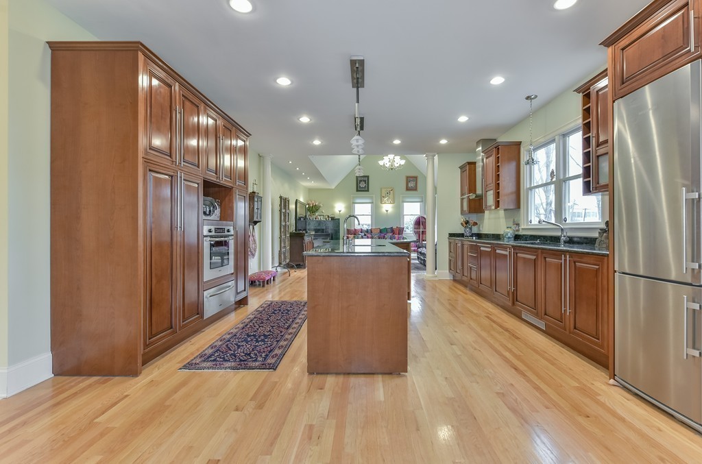 88 Wiswall Road Newton, MA 02459 - Photo 21 of 30 a kitchen with stainless steel appliances granite countertop a refrigerator a oven a sink and a oven