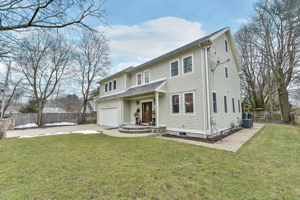 88 Wiswall Road Newton, MA 02459 - Photo 26 of 30 a front view of a house with a yard