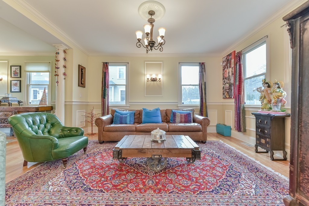 88 Wiswall Road Newton, MA 02459 - Photo 5 of 30 a living room with furniture and a chandelier