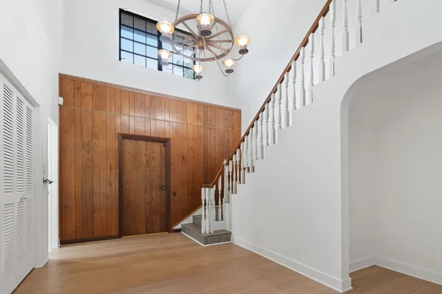a kitchen with stainless steel appliances sink refrigerator and cabinets