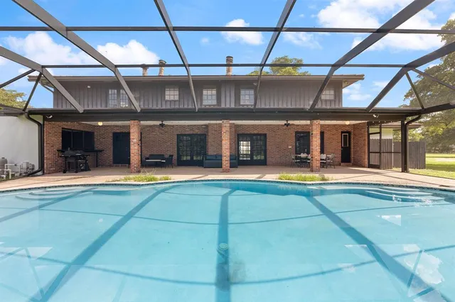 a view of a house with a swimming pool