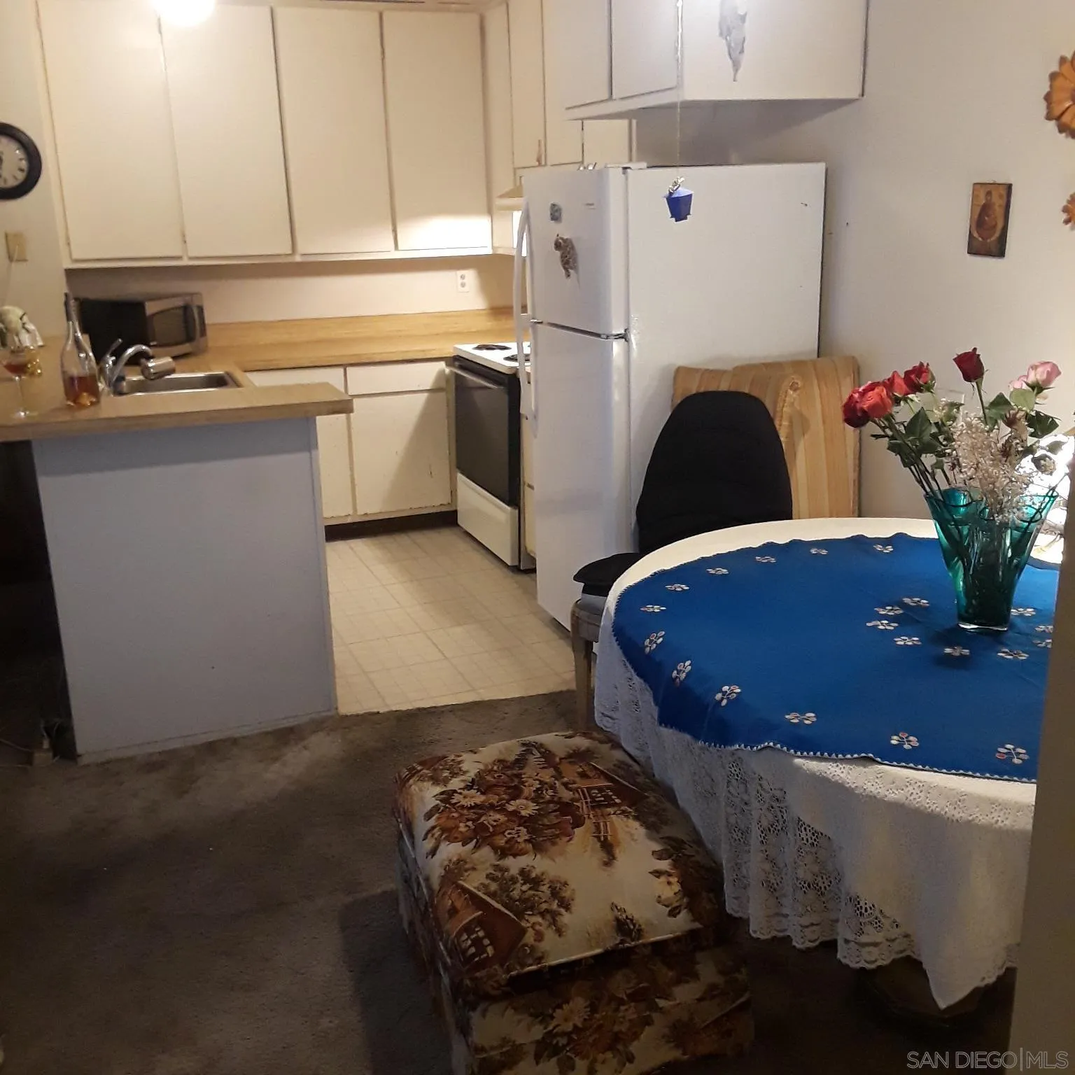 3550 Ruffin Road, Unit 233 San Diego, CA 92123 - Photo 4 of 17 a kitchen with a sink appliances and cabinets