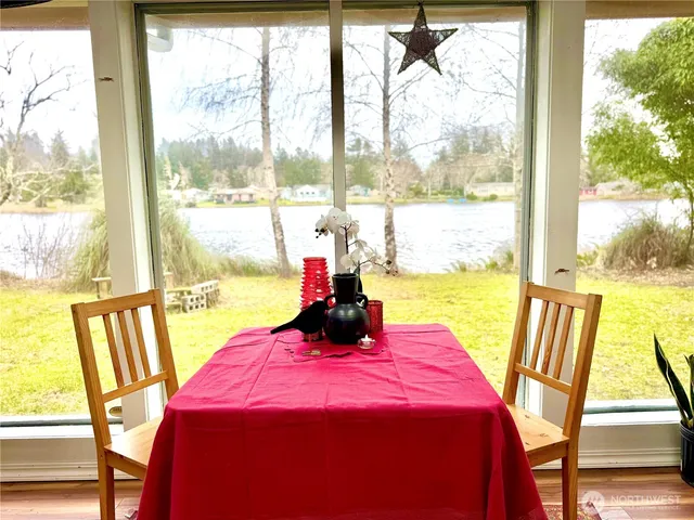 a workspace with furniture and a potted plant