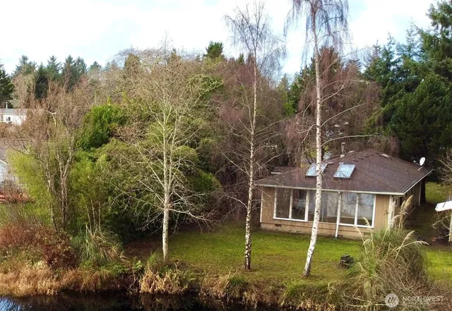a view of a house with a ocean view