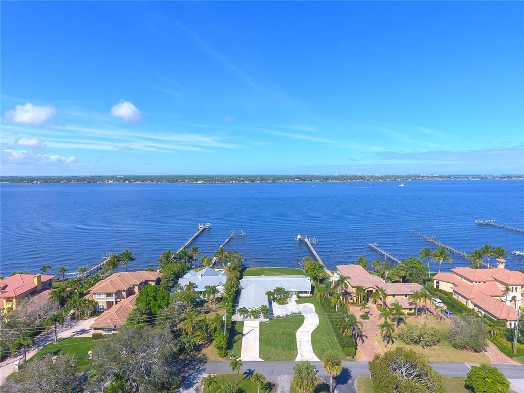 719 Southeast Riverside Drive Stuart, FL 34994 - Photo 2 of 17 a view of a city and an ocean