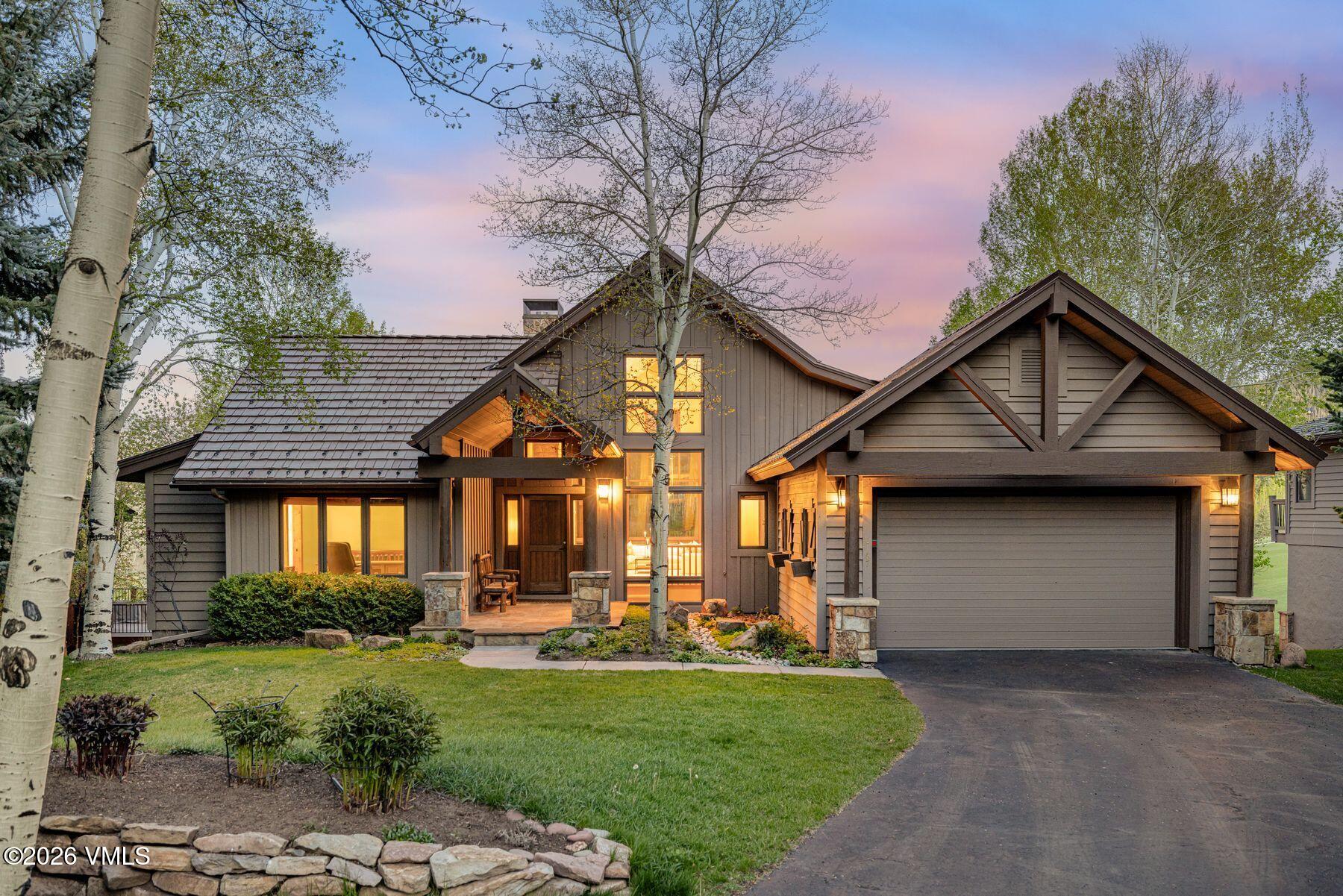 167 Saddle Ridge Edwards, CO 81632 - Photo 5 of 41 a front view of a house with a yard