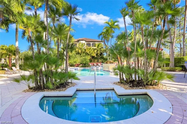 a view of a swimming pool with an outdoor space