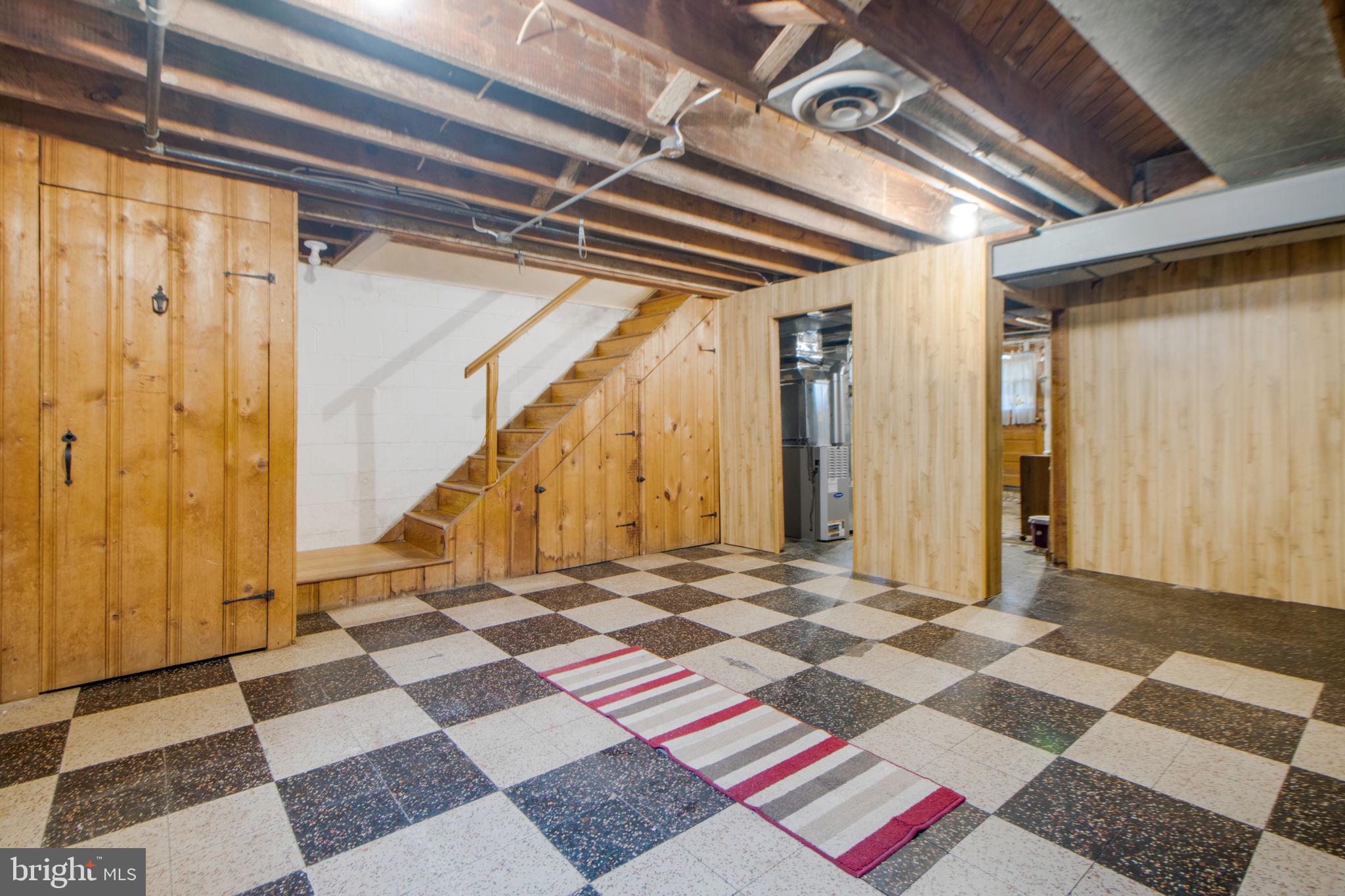 1903 Heathfield Road Baltimore, MD 21239 - Photo 25 of 30 a view of a room with wooden floor