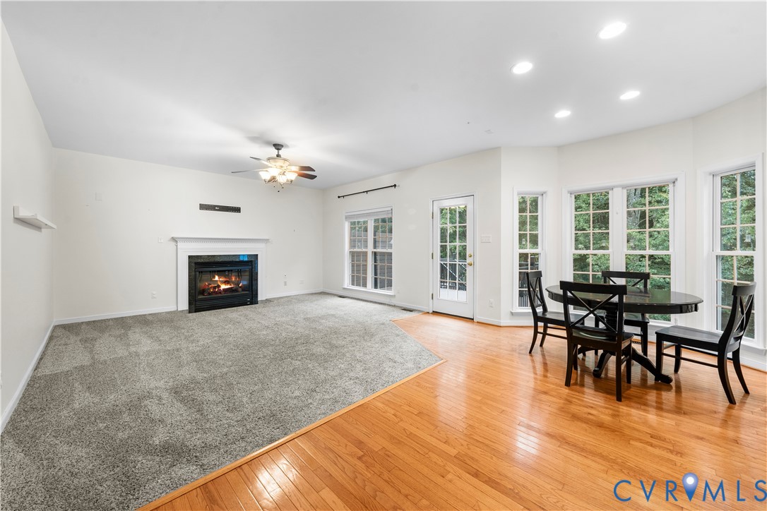 1301 Hawkins Wood Circle Midlothian, VA 23114 - Photo 14 of 50 a view of a livingroom with furniture fireplace and wooden floor
