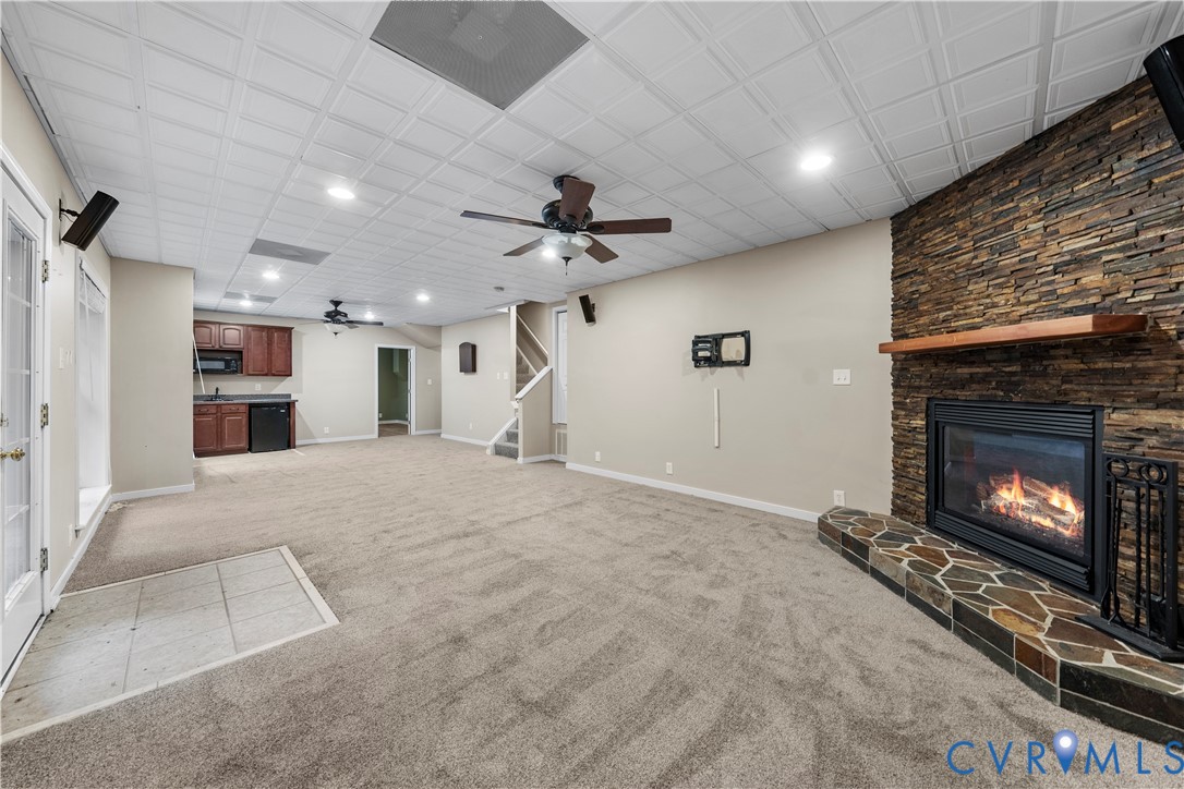 1301 Hawkins Wood Circle Midlothian, VA 23114 - Photo 21 of 50 a view of an empty room with a fireplace