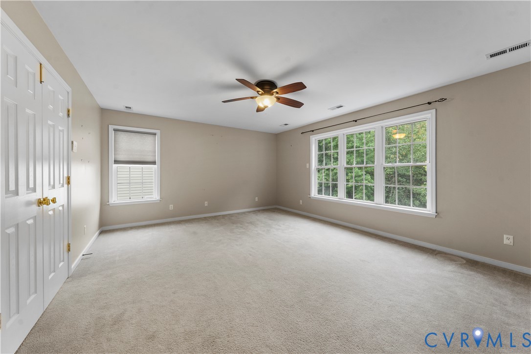 1301 Hawkins Wood Circle Midlothian, VA 23114 - Photo 27 of 50 a view of an empty room with a window