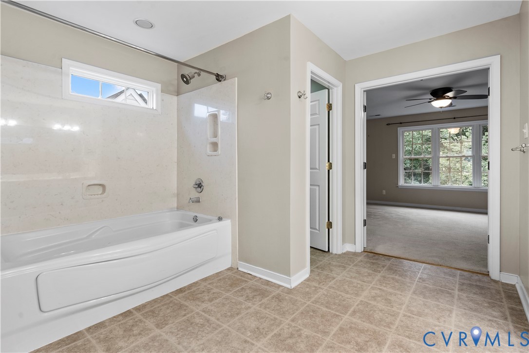 1301 Hawkins Wood Circle Midlothian, VA 23114 - Photo 30 of 50 a spacious bathroom with a bathtub and a shower