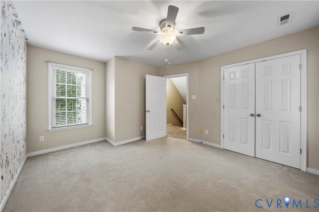1301 Hawkins Wood Circle Midlothian, VA 23114 - Photo 36 of 50 a view of an empty room with a window