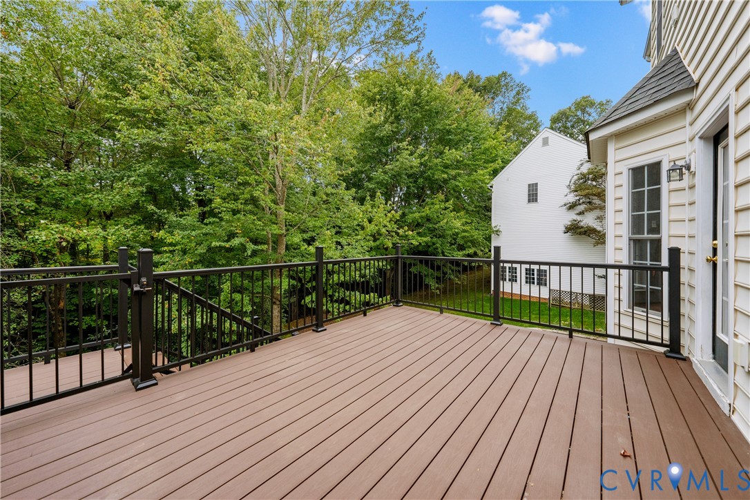 1301 Hawkins Wood Circle Midlothian, VA 23114 - Photo 41 of 50 a view of balcony with wooden floor and fence
