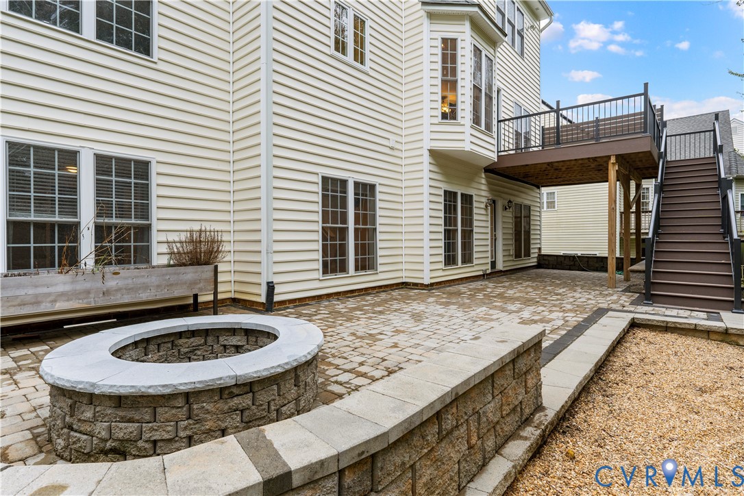 1301 Hawkins Wood Circle Midlothian, VA 23114 - Photo 45 of 50 a view of house with swimming pool and porch