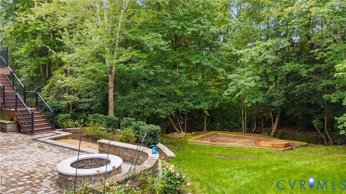 1301 Hawkins Wood Circle Midlothian, VA 23114 - Photo 46 of 50 a view of a swimming pool with a patio