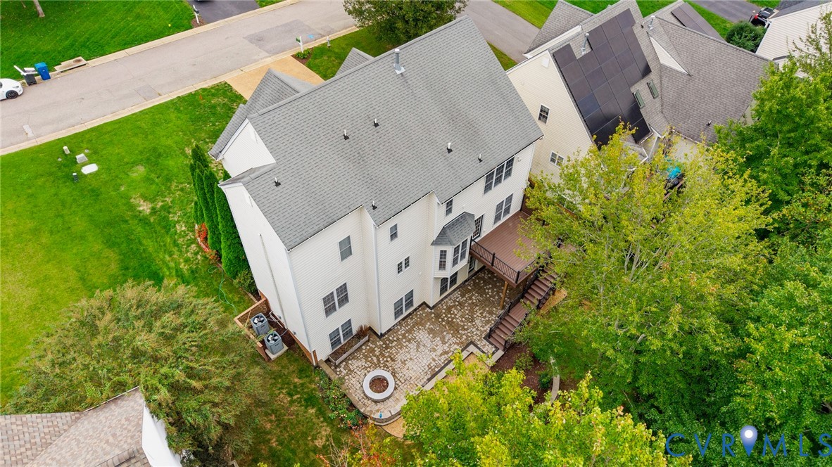 1301 Hawkins Wood Circle Midlothian, VA 23114 - Photo 48 of 50 an aerial view of a house with swimming pool and garden