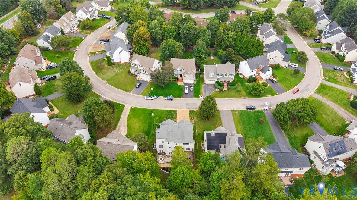 1301 Hawkins Wood Circle Midlothian, VA 23114 - Photo 49 of 50 an aerial view of a house with a garden and swimming pool