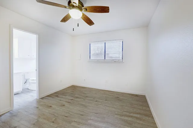 a kitchen with stainless steel appliances granite countertop refrigerator and a sink