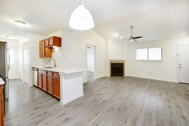 a view of a house with a backyard