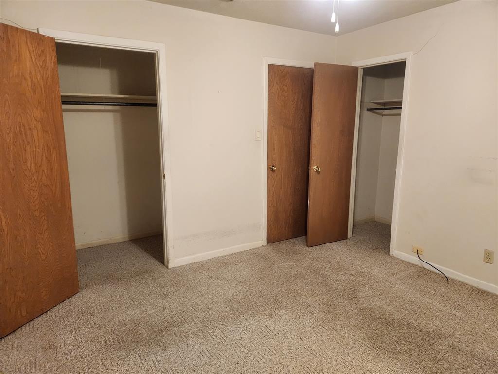 2821 Mccarley Drive Commerce, TX 75428 - Photo 26 of 32 an empty room with closet area