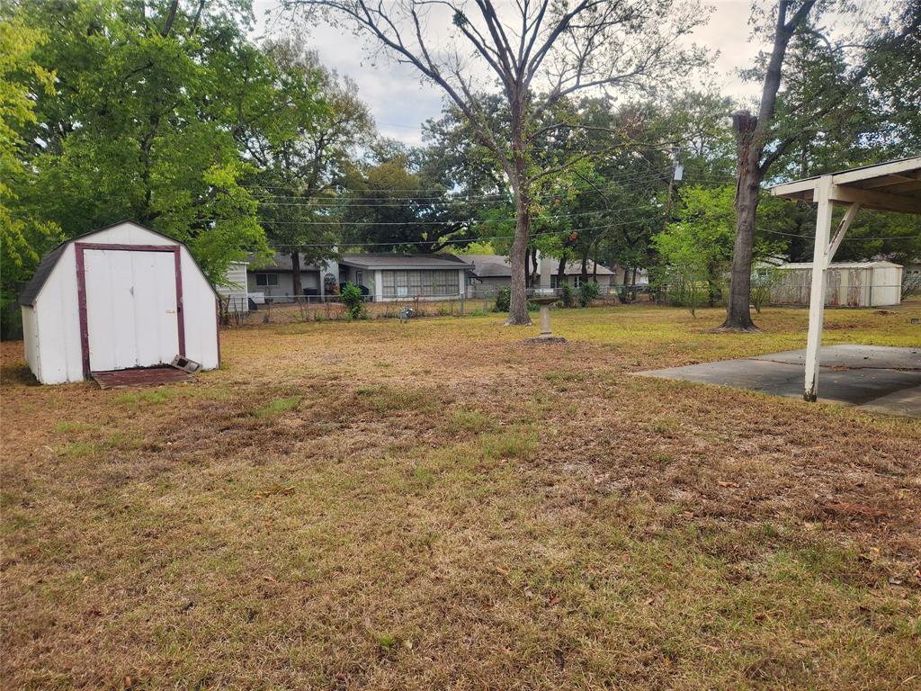 2821 Mccarley Drive Commerce, TX 75428 - Photo 4 of 32 a view of a house with backyard