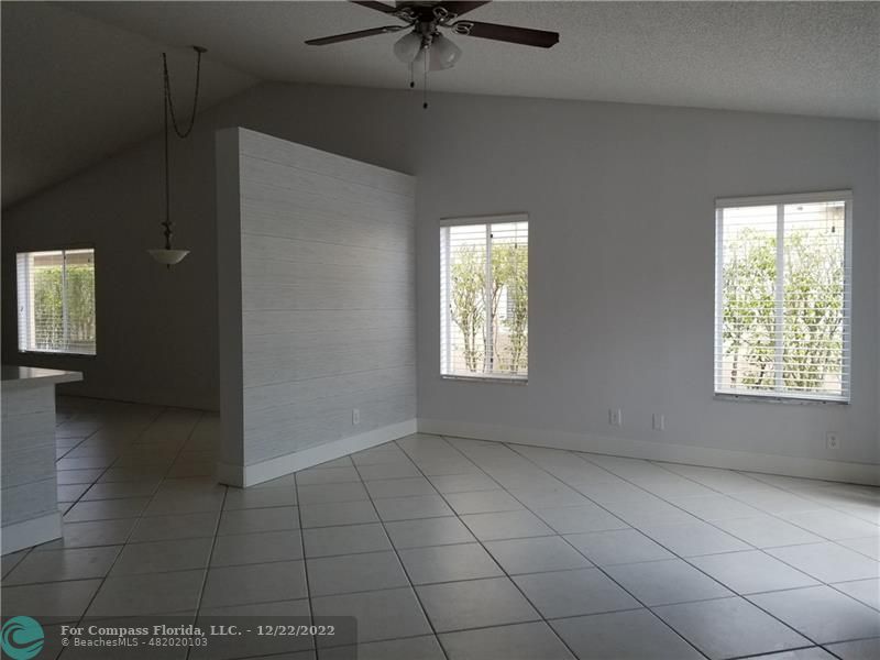 1527 Palermo Drive Weston, FL 33327 - Photo 4 of 15 a view of an empty room with a window