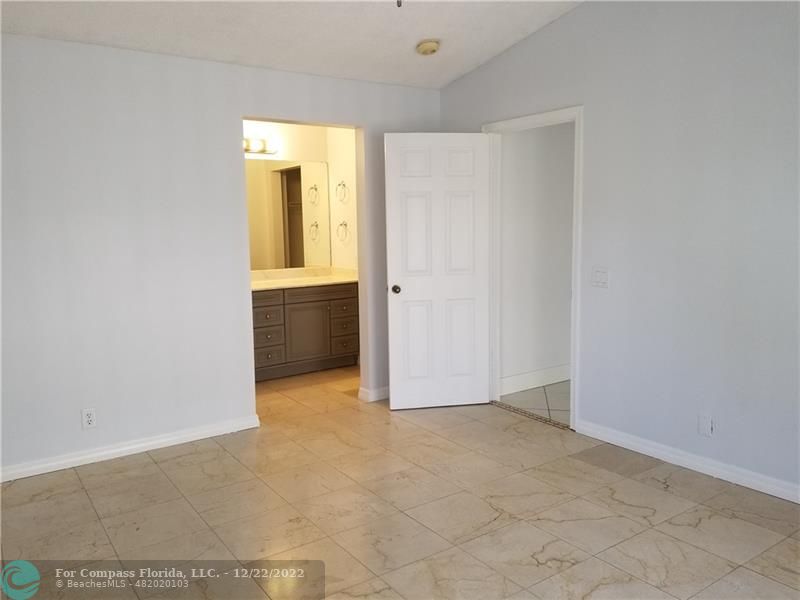 1527 Palermo Drive Weston, FL 33327 - Photo 5 of 15 an empty room with windows