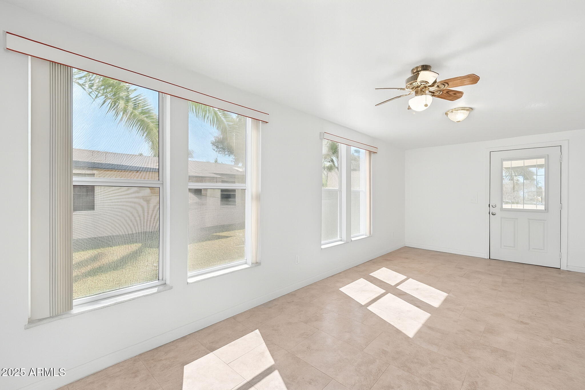3700 South Tomahawk Road, Unit 39 Apache Junction, AZ 85119 - Photo 36 of 53 a view of an empty room with a window