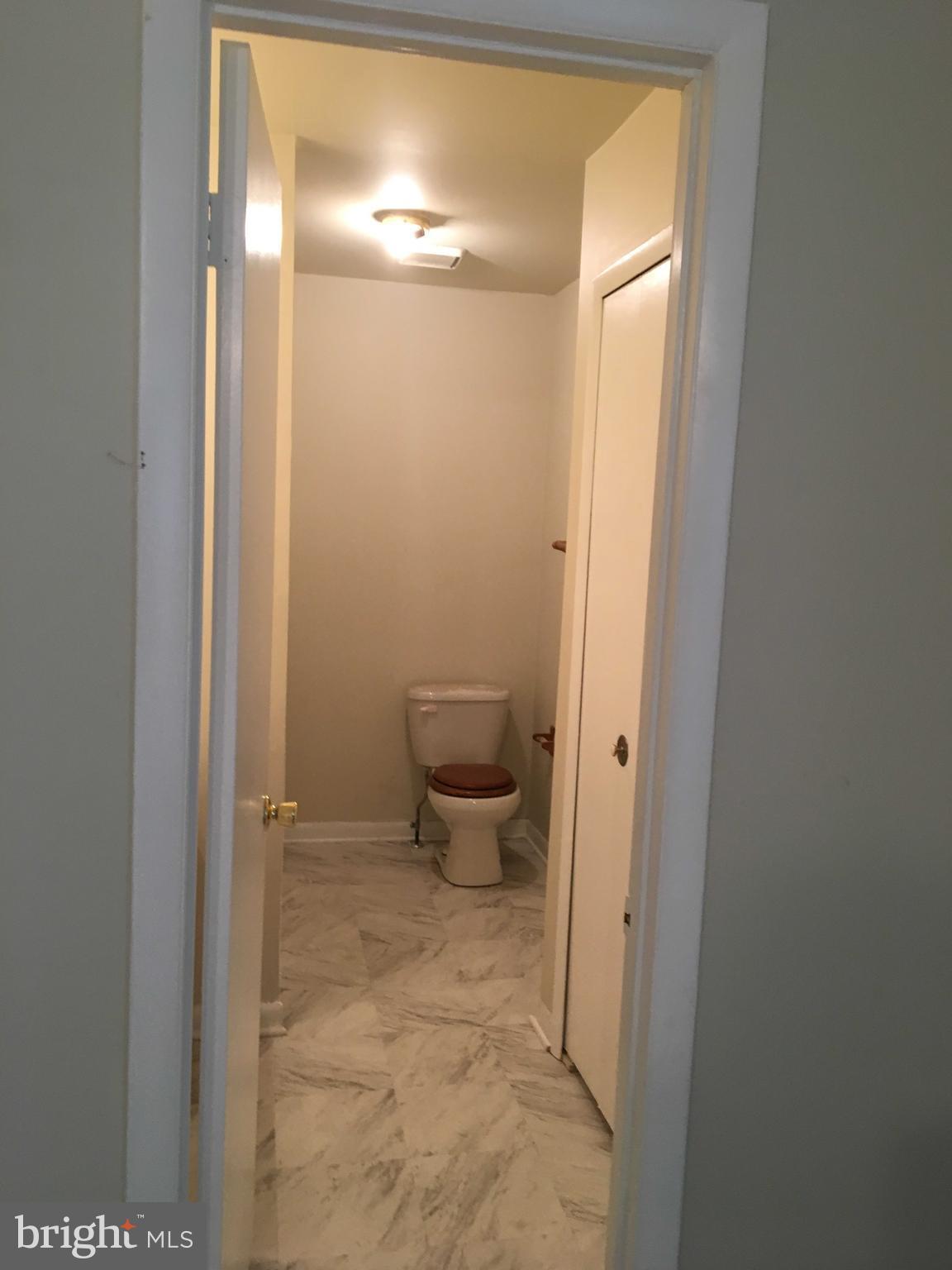6249 Light Point Place Columbia, MD 21045 - Photo 16 of 18 a bathroom with a sink and a toilet