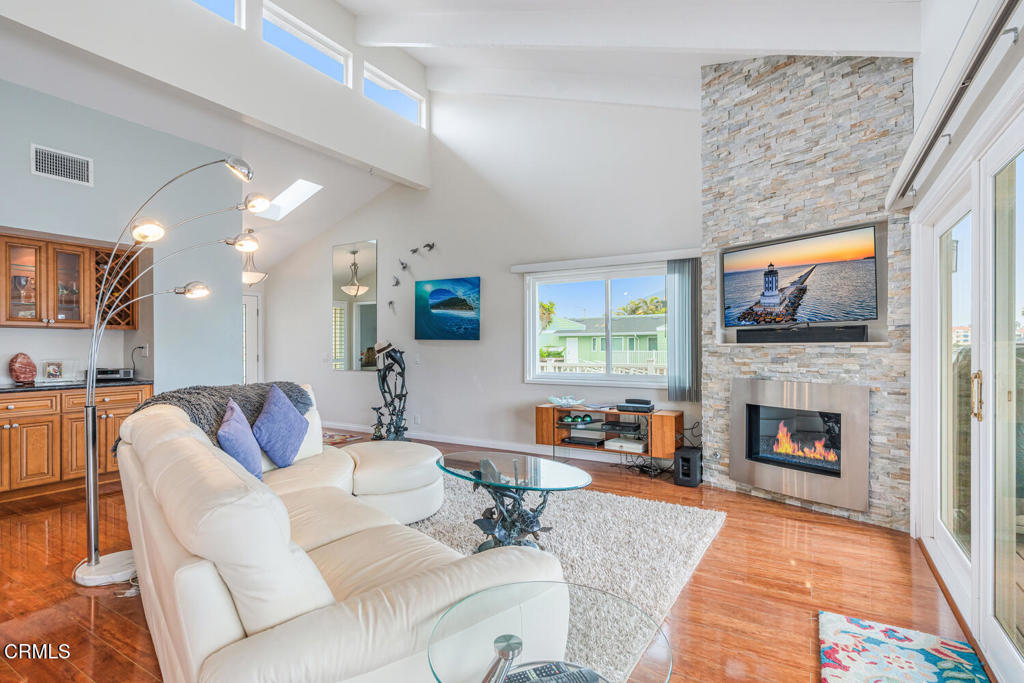 4604 Falkirk Bay Oxnard, CA 93035 - Photo 9 of 40 a living room with furniture and a fireplace