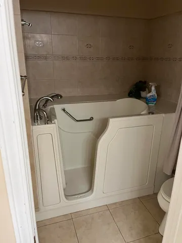 a view of bathroom with a toilet and a sink