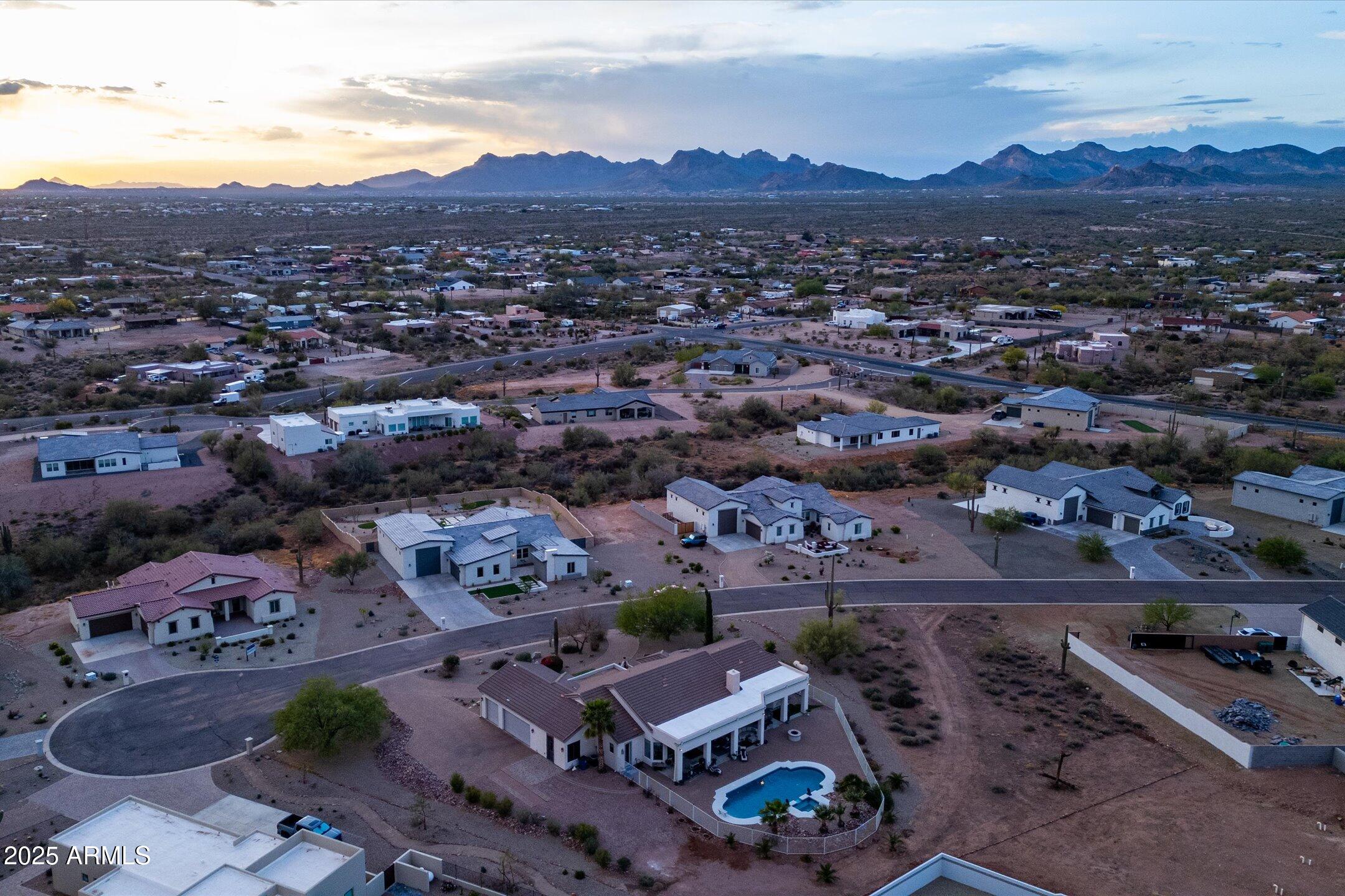 619 North Sun Road Apache Junction, AZ 85119 - Photo 59 of 72 an aerial view of residential houses and outdoor space