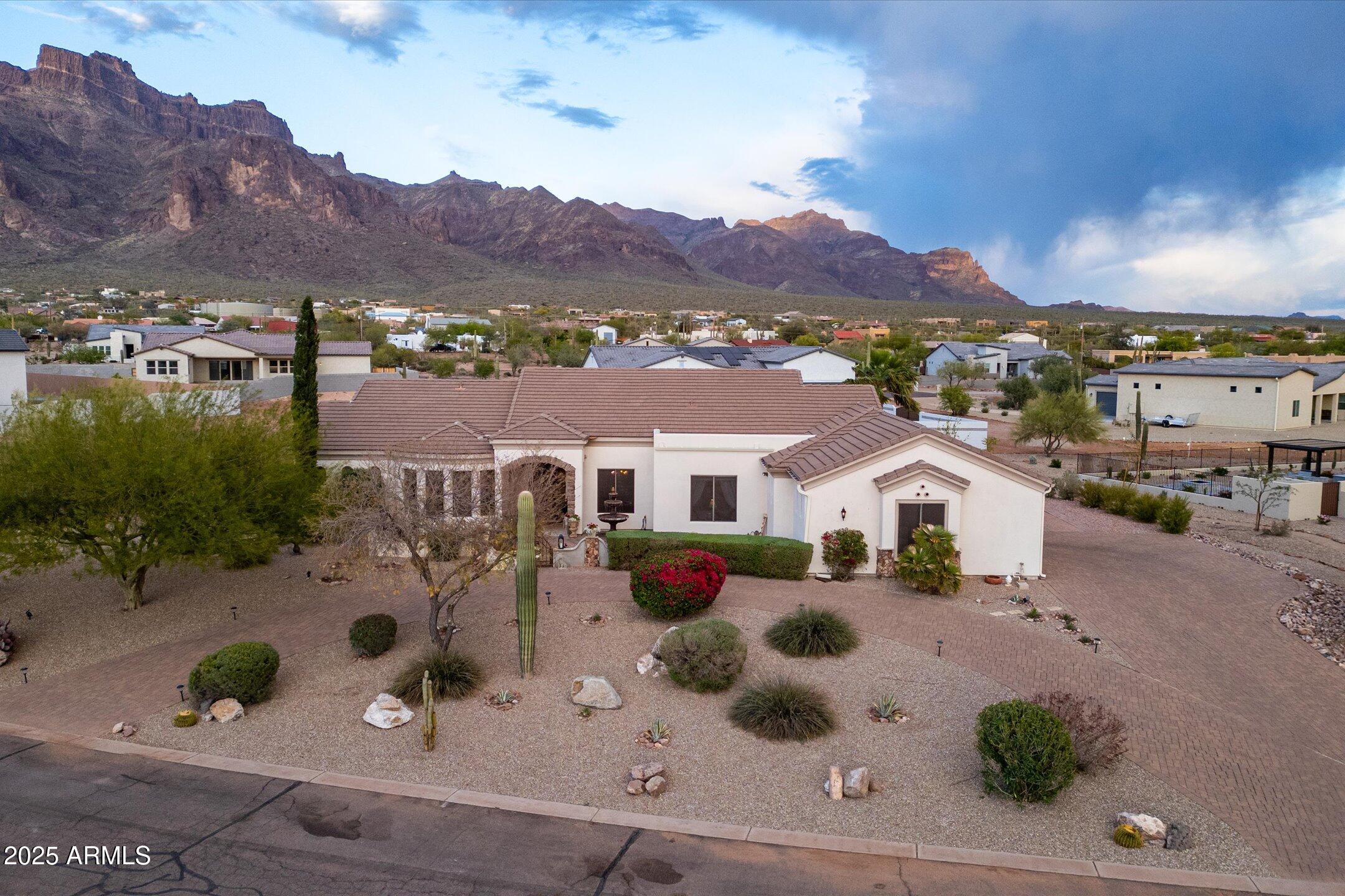 619 North Sun Road Apache Junction, AZ 85119 - Photo 62 of 72 an aerial view of residential houses and outdoor space