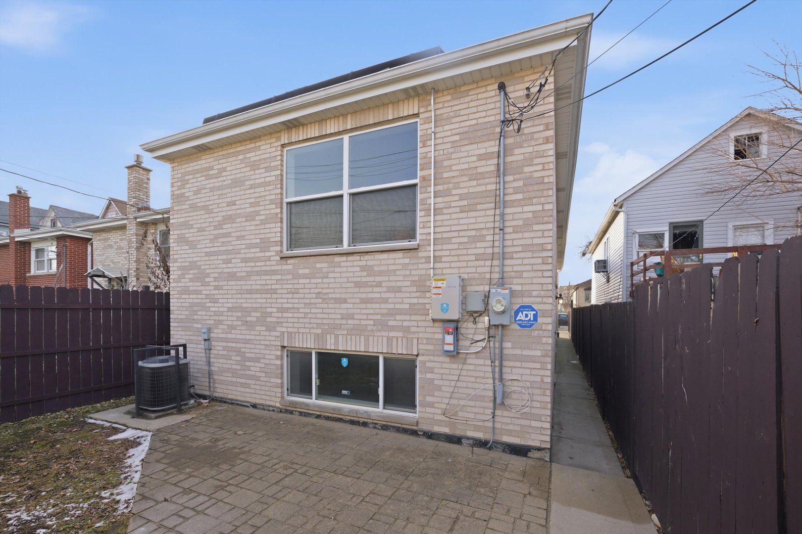 4063 South Rockwell Street Chicago, IL 60632 - Photo 20 of 24 a front view of a house with a garage