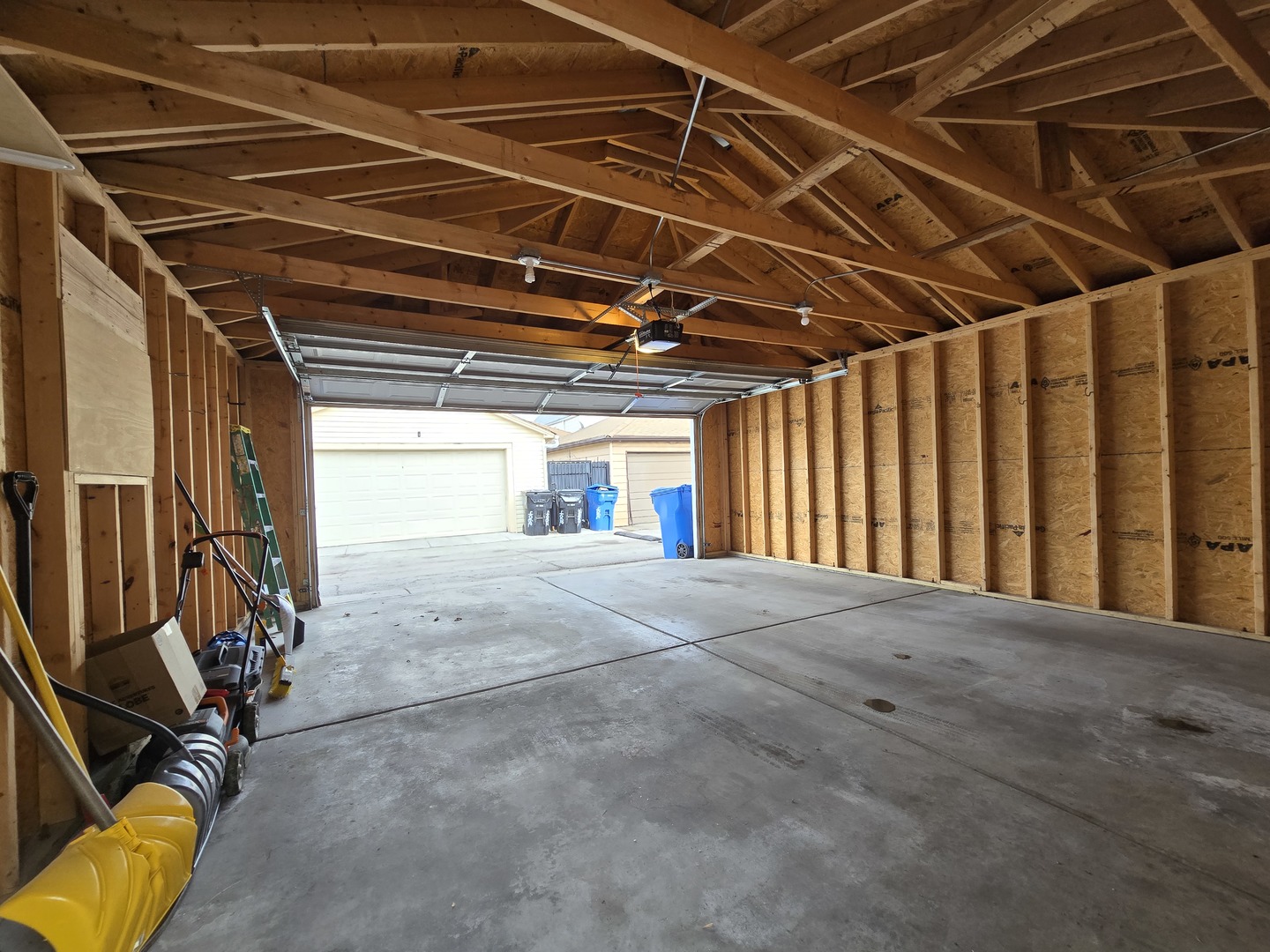4063 South Rockwell Street Chicago, IL 60632 - Photo 22 of 24 a view of an empty room with wooden walls