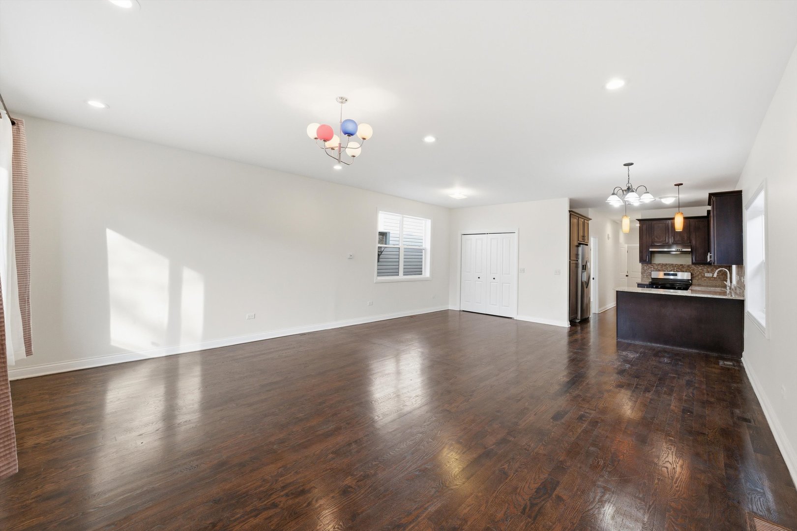 4063 South Rockwell Street Chicago, IL 60632 - Photo 6 of 24 a view of kitchen and hall with wooden floor