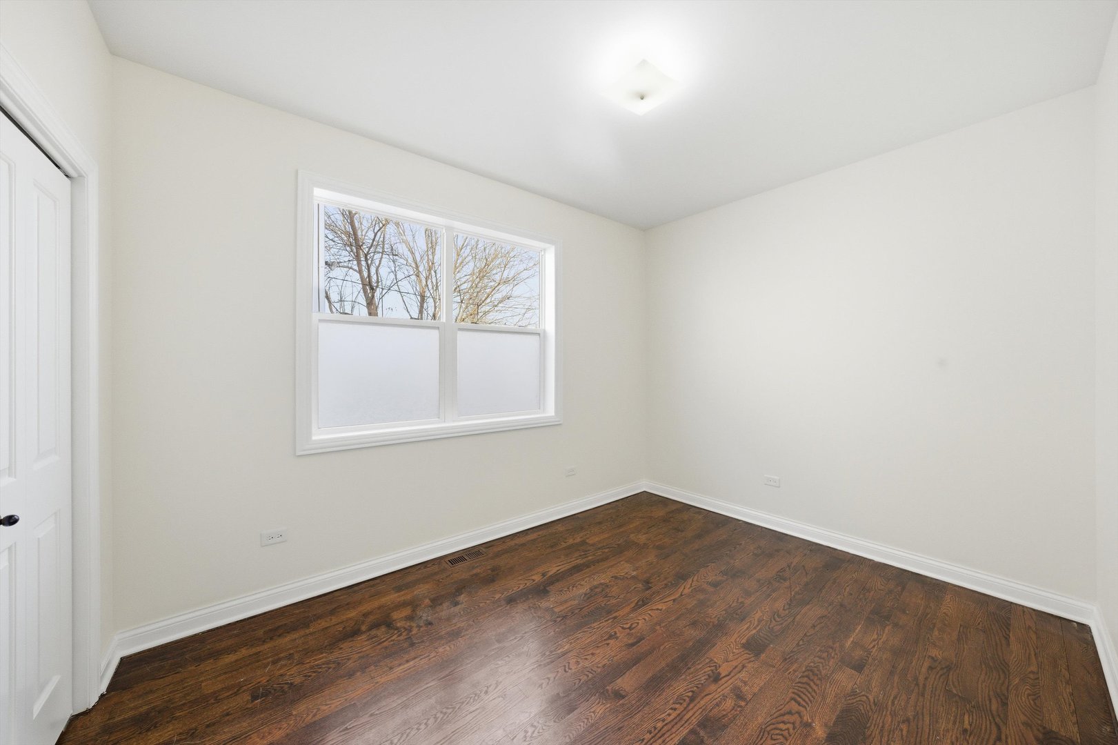 4063 South Rockwell Street Chicago, IL 60632 - Photo 10 of 24 an empty room with a window