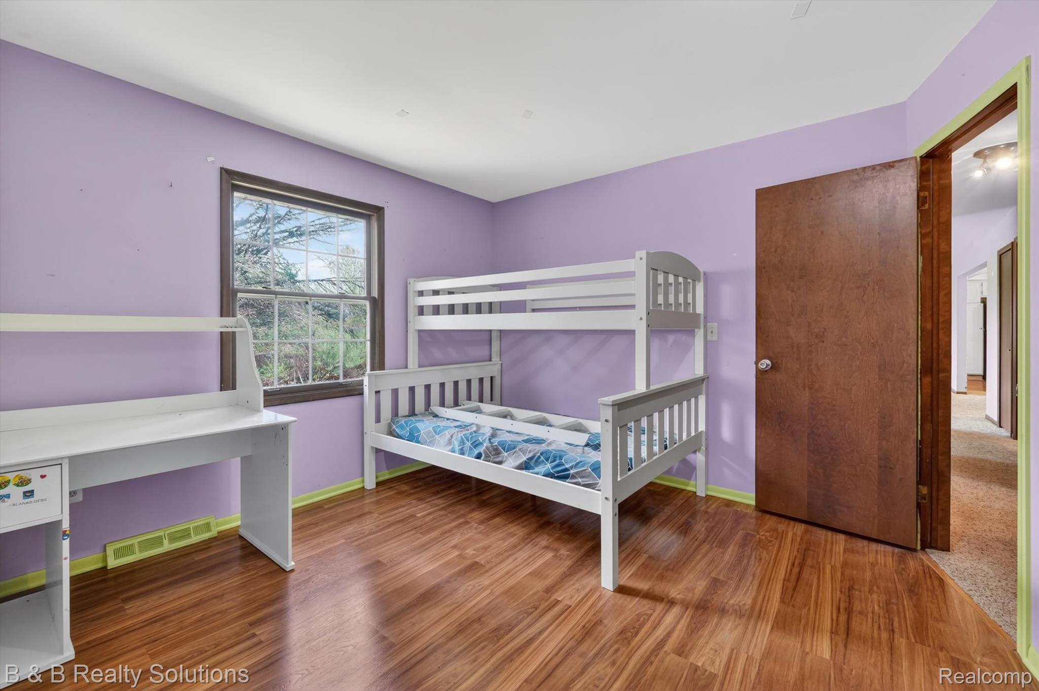 2467 North Lake George Road Metamora, MI 48455 - Photo 27 of 46 Bedroom featuring wood finished floors and baseboards