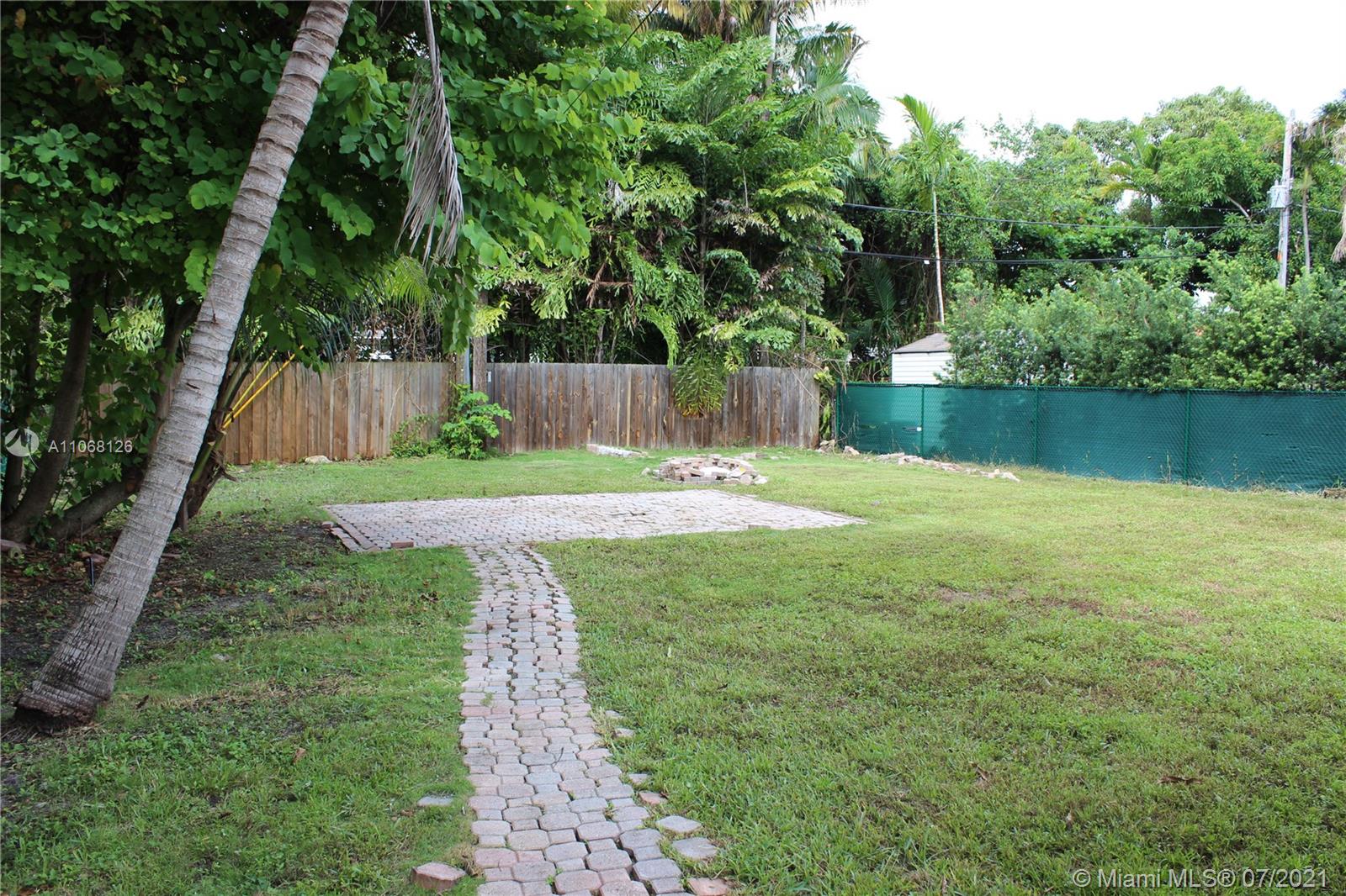 435 Southwest 31st Road Miami, FL 33129 - Photo 3 of 3 a view of a backyard