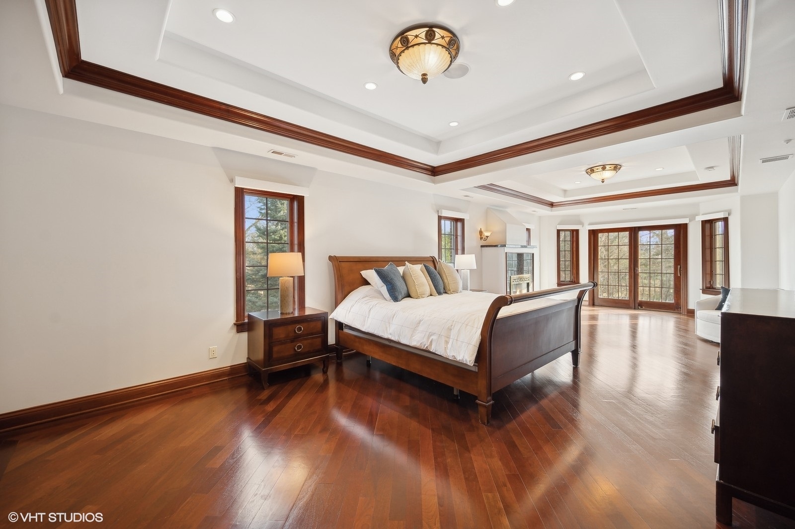3235 Techny Road Northbrook, IL 60062 - Photo 20 of 45 a spacious bedroom with a bed and wooden floor