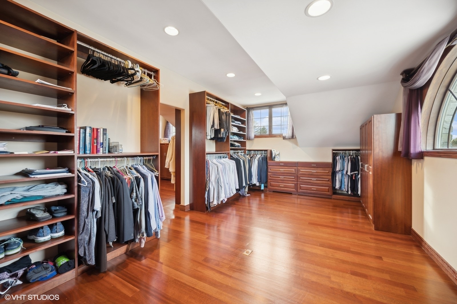 3235 Techny Road Northbrook, IL 60062 - Photo 23 of 45 a view of a walk in closet with clothes and shoes