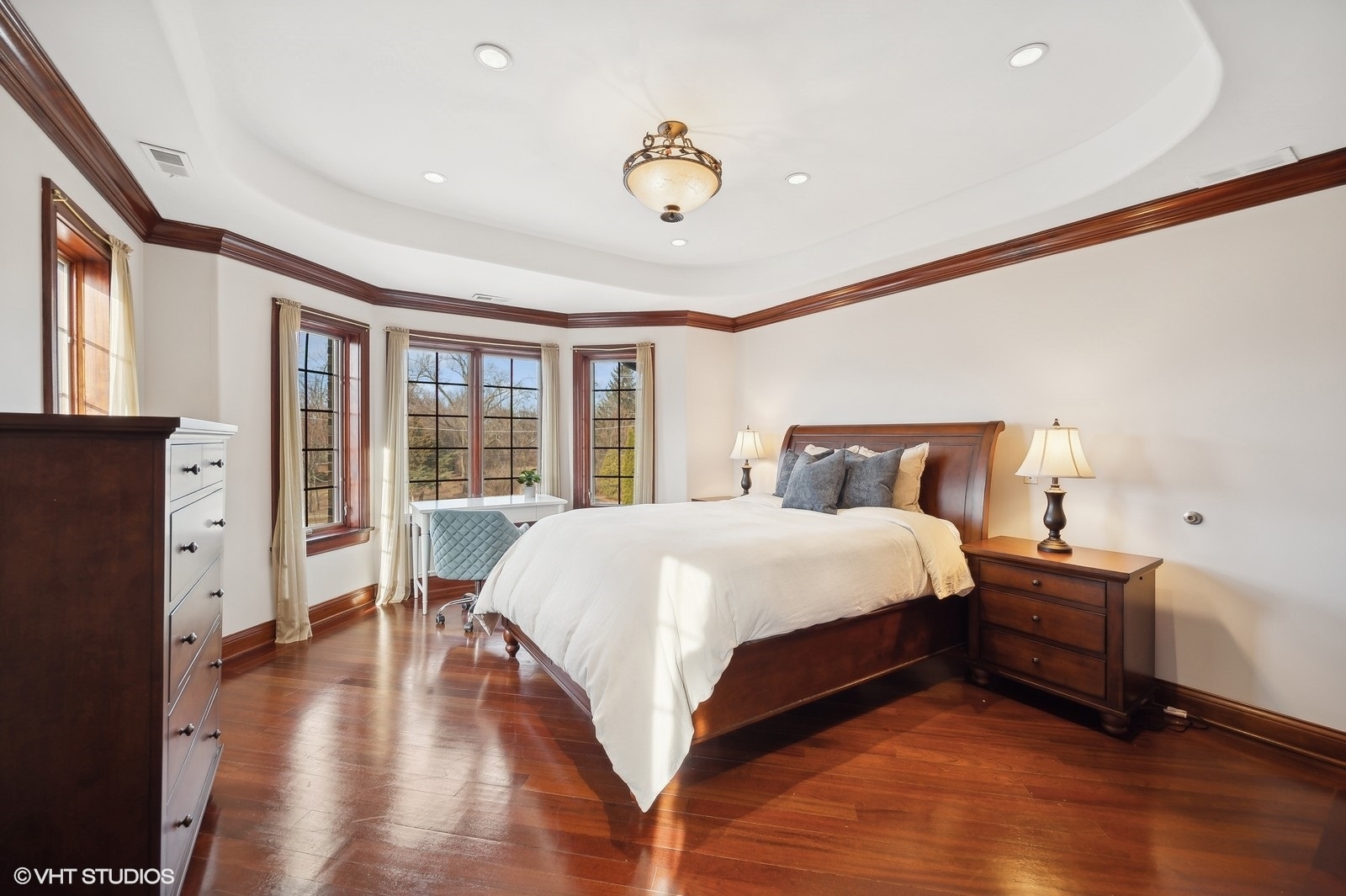 3235 Techny Road Northbrook, IL 60062 - Photo 28 of 45 a bedroom with a bed and wooden floor