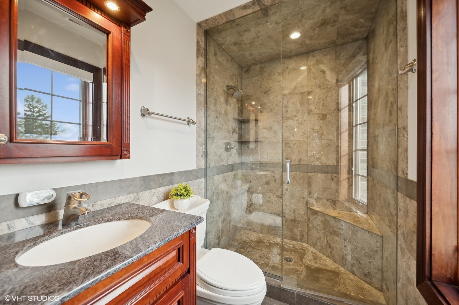 3235 Techny Road Northbrook, IL 60062 - Photo 29 of 45 a bathroom with a sink a toilet and shower